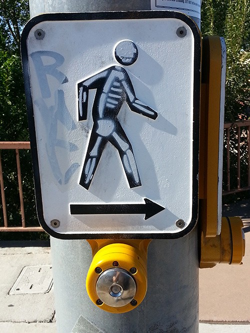 Altered crosswalk sign in Santa Fe, NM