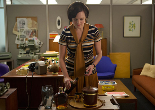 Elisabeth Moss as Peggy Olson.