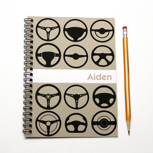 black steering wheel cover  notebook or planner